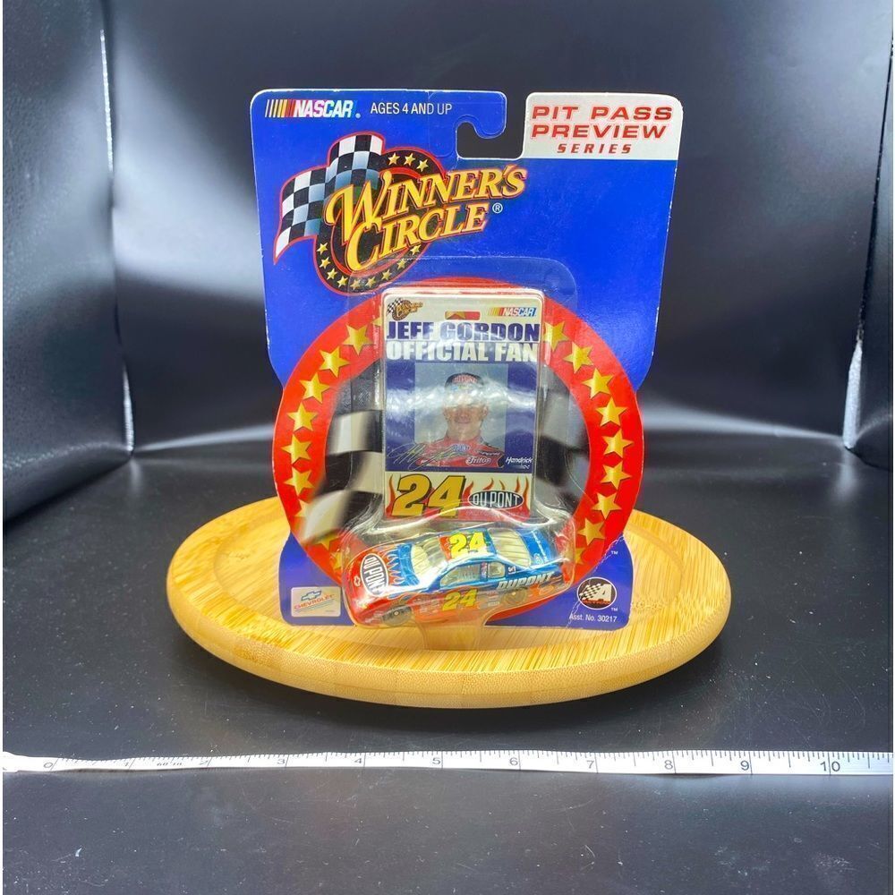 2002 Jeff Gordon pit pass badge and 1:64 scale NASCAR car